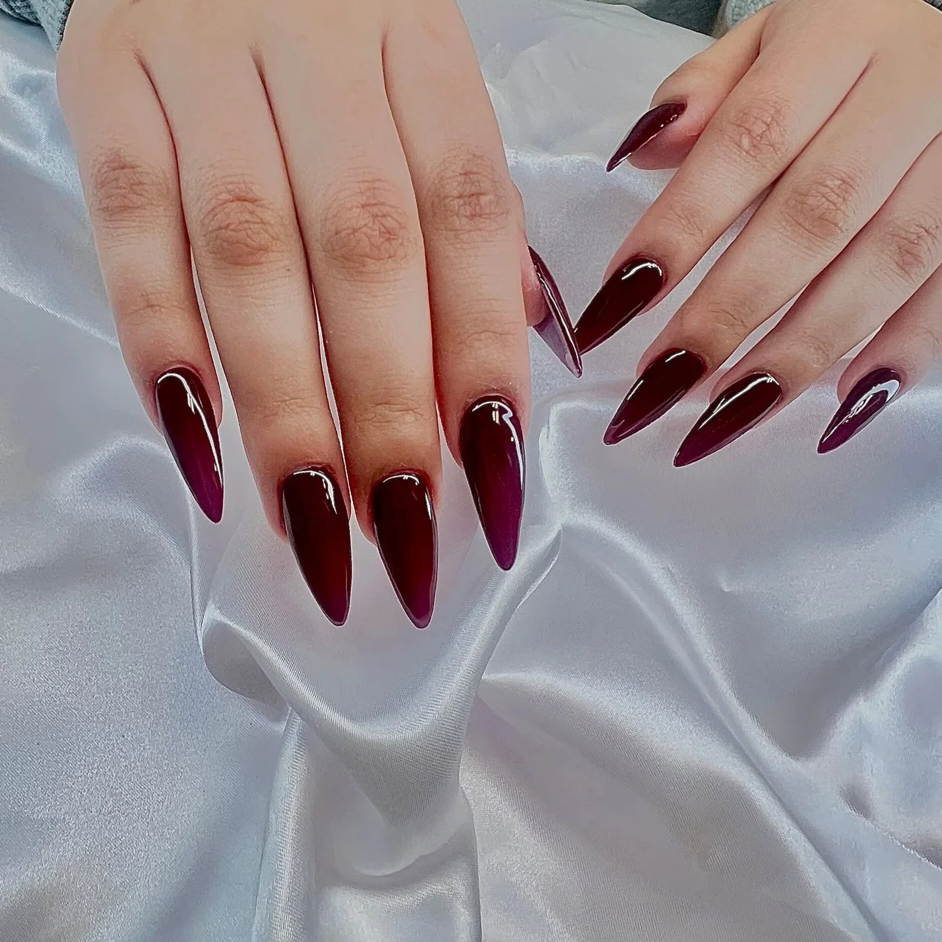 Deep glossy burgundy pointed nail set