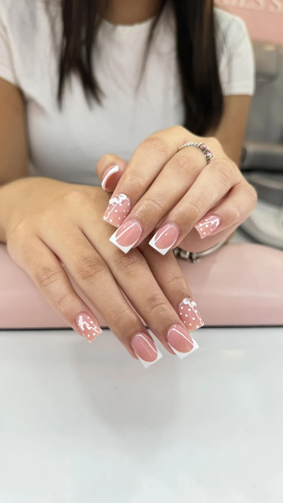 Classic French manicure with pretty nail details
