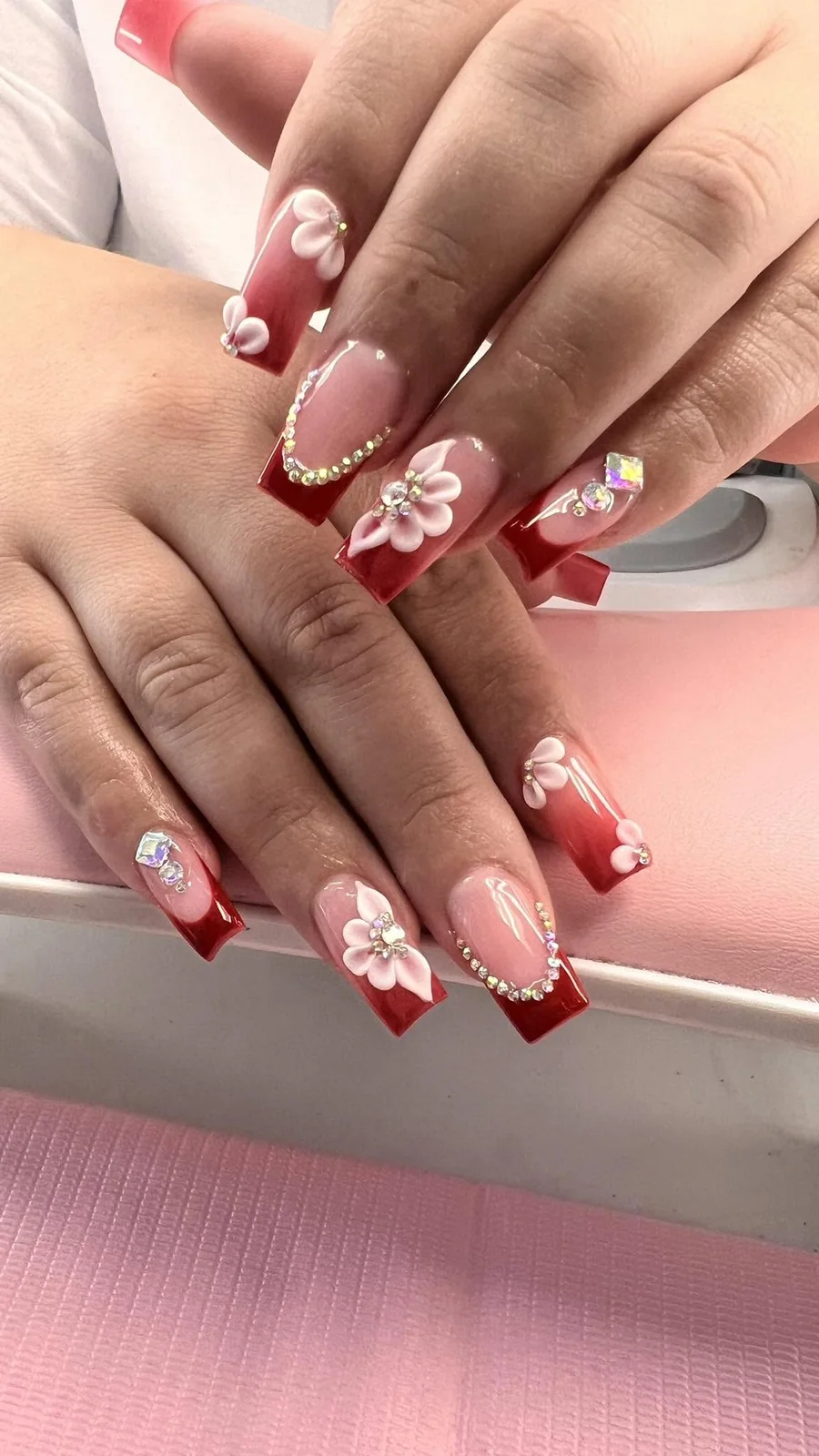 Sculpted floral nail art by J&R Nail Salon